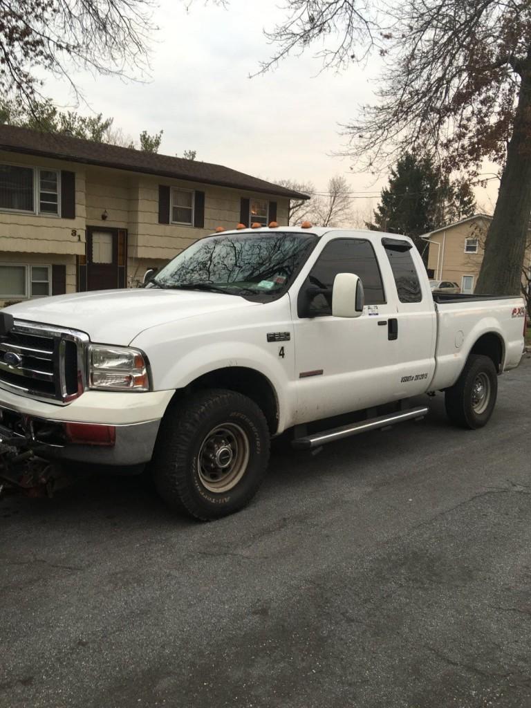2002 Ford F 250 with a 8ft western plow