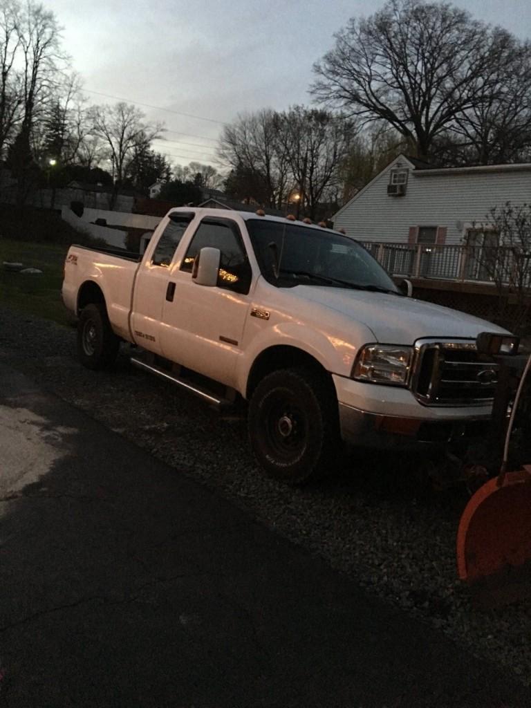 2002 Ford F 250 with a 8ft western plow