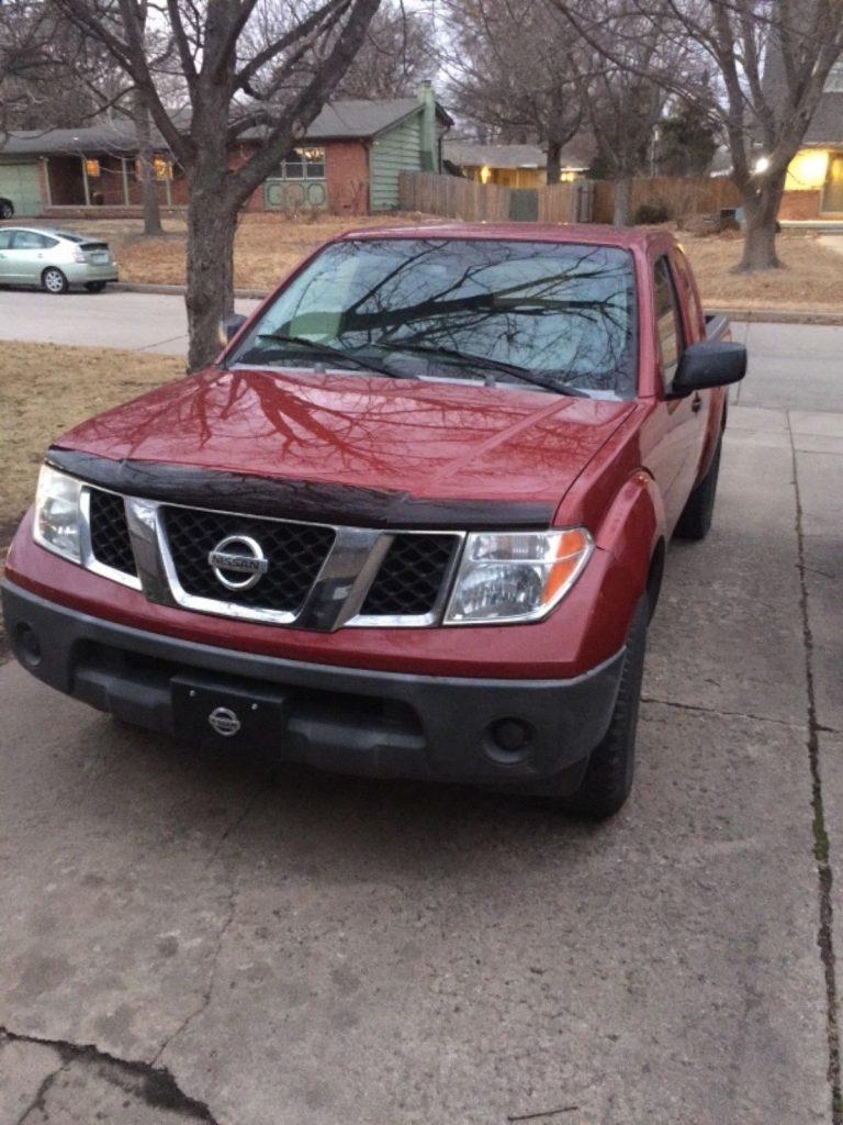 hail damage 2006 Nissan Frontier XE pickup
