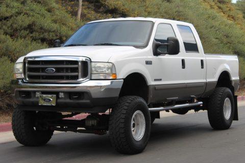 well modified 2003 Ford F 250 Lariat pickup for sale