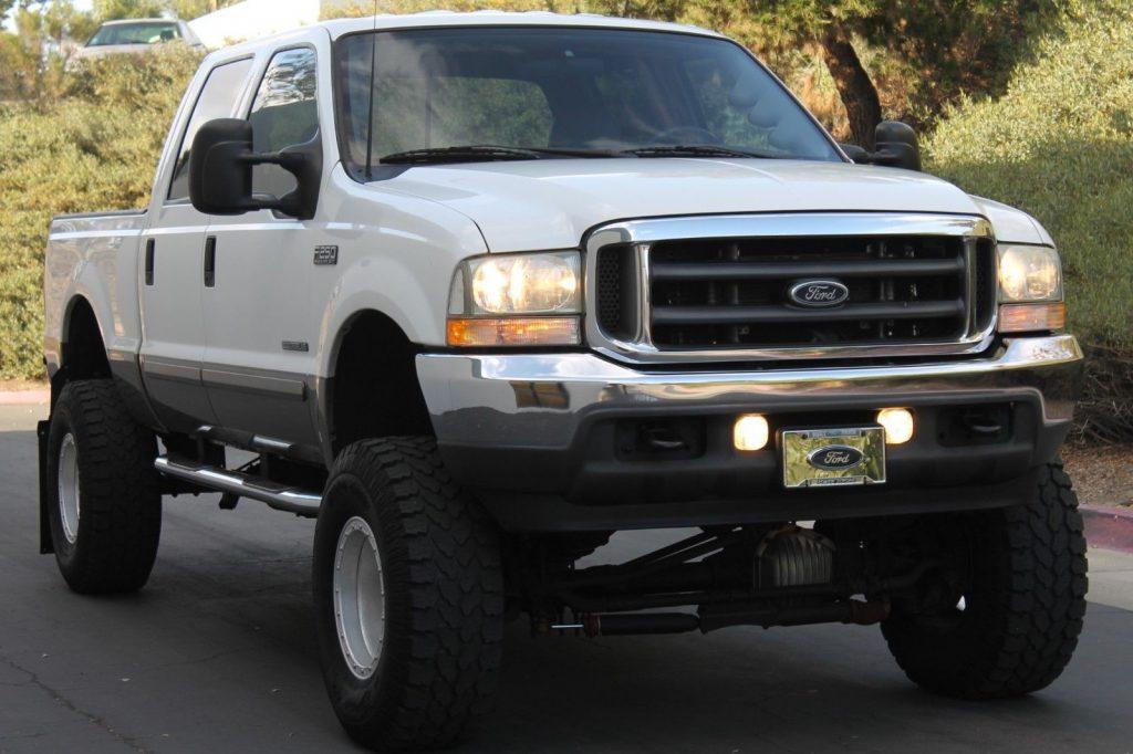 well modified 2003 Ford F 250 Lariat pickup