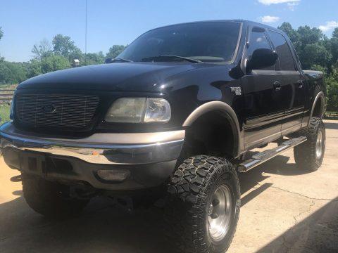 lifted 2003 Ford F 150 Lariat pickup for sale