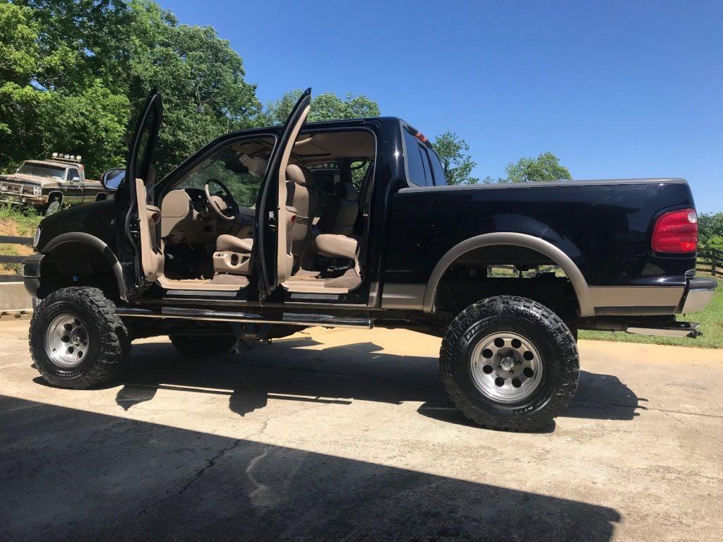 lifted 2003 Ford F 150 Lariat pickup