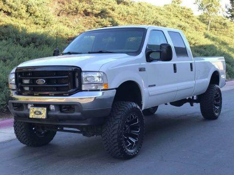 many upgrades 2001 Ford F 350 XLT long bed pickup for sale