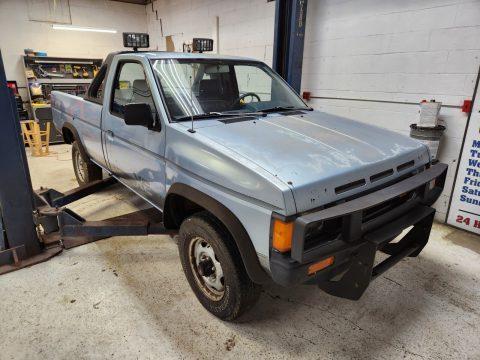 1987 Nissan D21 Hardbody long bed with contour styled light bar and grille guard for sale